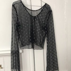 Urban outfitters top w/ stars and flowing sleeves.